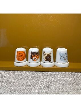 Vintage 4 PC Porcelain Cat Faces Thimbles